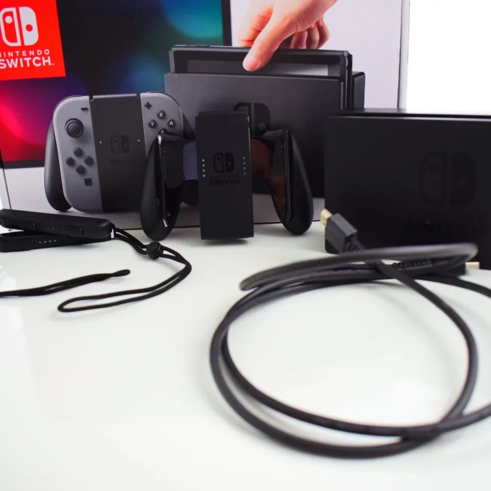 Nintendo Switch HAC-001 32GB Console with Gray Joy‑Con, Zelda case & 8 games inc